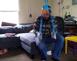 Bill tries on the monkey game.