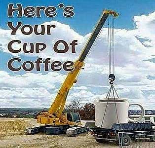 A massive crane is holding a massive white cup taking up the back of a flatbed truck. Caption: Here's Your Cup Of Coffee.