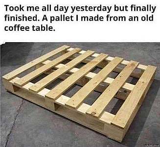 A wooden pallet laying on concrete. Caption: Took me all day yesterday but finally finished. A pallet I made from an old coffee table.