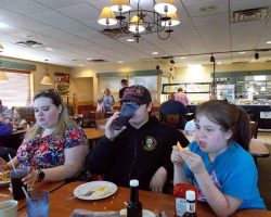 Casey, Leelan, and Lyra eating