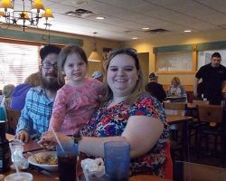 Casey and Bill with almost-4YO Luna, all smiles! (Our server, Beau, is in the background - he was great!)