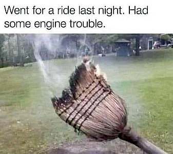 A photo of a broom with the bottom on fire and smoking. Caption: Went for a ride last night. Had some engine trouble.