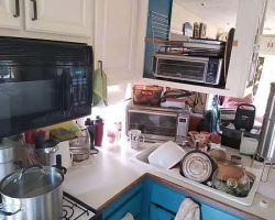 The Ninja air fryer is moved off the counter, and the convection oven is moved down to the back of the counter, behind the sink; a couple of items that were taking up valuable counter space are now on top of it, and we have MUCH more space next to the stove and next to the sink!