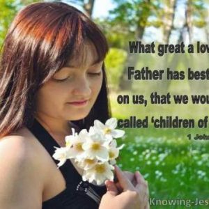 What great a love the Father has bestowed on us, that we would be called 'children of God' 1John 3:1 A photo of a young woman holding some flowers, looking down at them, with blurred grass and trees in the background. (Knowing-Jesus.com)