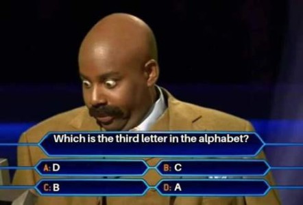 A man, bald with a mustache, on a game show, with a befuddled look on his face. At the bottom is the question, "Which is the third letter of the alphabet?" The choices are A) D...B) C...C) B...D) A