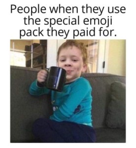 A young child with holding a coffee cup near his mouth and a self-satisfied look on his face. Caption: People when they use the special emoji pack they paid for.