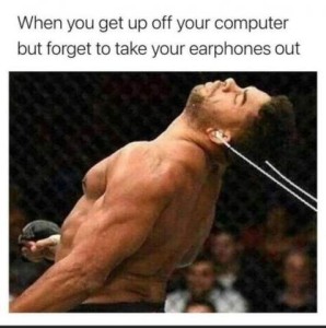 Photo of a boxer how apparently has just been hit, as he's falling backward; he has earbuds in his ears. Caption: When you get up off your computer but forget to take your earphones out.