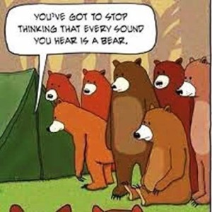 A cartoon of a group of bears standing around a tent, listening to its occupants. Speech bubble from inside the tent says, "You've got to stop thinking that every sound you hear is a bear!"