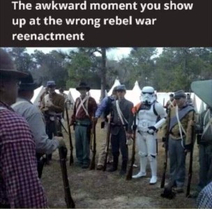 A line of men in costumes of rebel and union soldiers except one guy in a Star Wars fighter costume; there are tents in the background. Caption: The awkward moment you show up at the wrong rebel war reenactment.