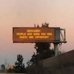 Digitized road sign says, "Reminder: People who show you new music are important."