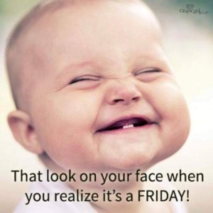 A baby grinning, 2 tiny lower teeth showing, eyes squinched closed. Caption: That look on your face when you realize it's a FRIDAY!
