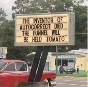 Roadside sign: The inventor of autocorrect died. The funnel will be held tomato.