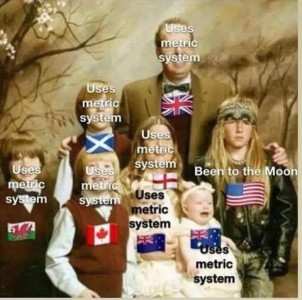 Family picture from the 70s of a father, mother, and 5 children. All of the children but one have flags on the front of their shirts from UK, Canada, etc. and the words "Uses metric system"; One child, an apprarent rebel with a leather jacket, sullen expression, long hair, and headband has a US flag with the words, "Been to the moon."