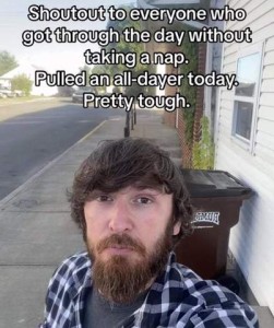 Photo of a man standing on a sidewalk, a trash can behind him, houses to his left and an empty street to his right. Caption: Shoutout to everyone who got through the day without taking a nap. Pull an all-dayer today. Pretty tough.