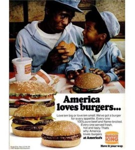 An old Burger King ad showing a father and young son eating burgers together, America loves burgers.