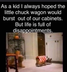Text: As a kid I always hoped the little chuck wagon would burst out of our cabinets. But life is full of disappointments. Photo from the old Chuck Wagon dog food commercials, with a tiny wagon train being pulled by tiny horses across a kitchen floor as a little fluffy little brown dogs watches.