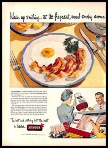 An old ad for Armour with photos of bacon and eggs, and ham. The best and nothing but the best is labeled Armour.
