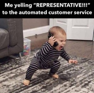 Photo of a toddler holding a phone up to his ear and screaming angrily. Caption: Me yelling, "REPRESENTATIVE!!!" to the automated customer service.
