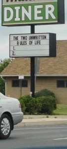 Photo of a diner roadside sign that says, "The two unwritten rules of life: 1. 2."