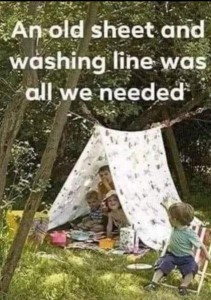 Photo of children playing in a sunny yard under and around a homemade tent. Caption: An old sheet and washing line was all we needed.