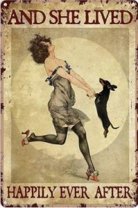Vintage-looking picture of a woman dressed in a 20's style, head back and one leg kicked out behind her as though dancing, as she holds a dachshund's front feet as if he is her dancing partner. Caption: And she lived happily ever after.