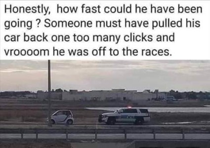 A photo of a police car that has pulled over a tiny little mini-car on the side of the road. Caption: Honestly, how fast could he have been going? Someone must have pulled his car back one too many clicks and vroooom he was off to the races.