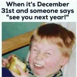 Out of focus photo of a boy eating an apple with a scrunched up face. Caption: When it's December 31st and someone says, "See you next year!"