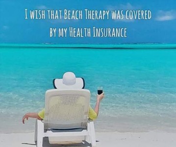 Photo of a clear bright blue sky over a gorgeous turquoise bay coming up to a white beach. A woman in a floppy white hat is sitting in a beach chair, back to the camera, holding a drink. Caption: I wish that Beach Therapy was covered by my health insurance.