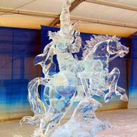 A horse rearing up with a detailed rider that I can't identify