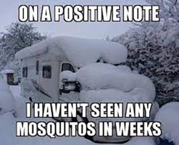 Photo of a motorhome covered in at least a foot of snow. Caption: On a positive note, I haven't seen any mosquitos in weeks!
